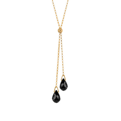 This Gold Fill Rutile Lantern Lariat Necklace is handcrafted by artist Pamela Lauz. The necklace is made with a 14k gold-filled chain and two genuine rutile drops.  The necklace is 17" long and the lariat drops down an additional 2.25".