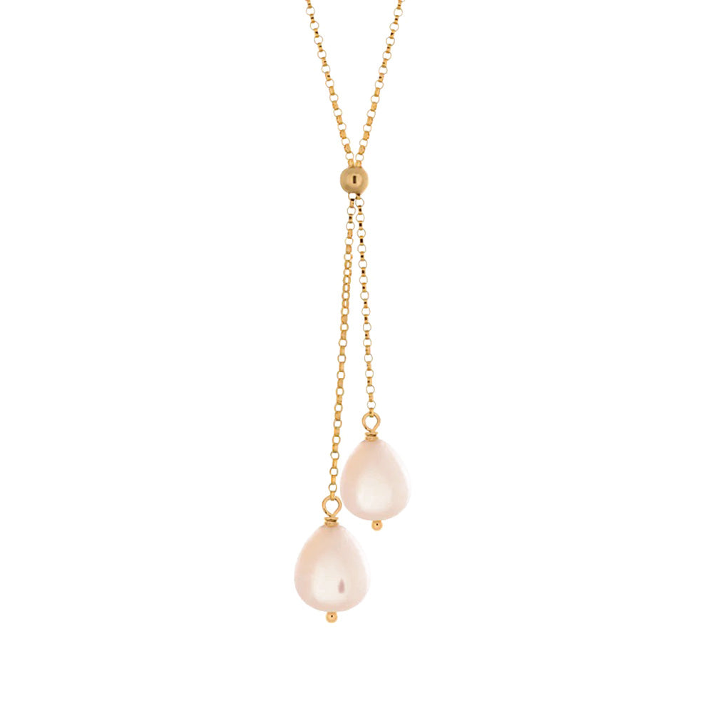 This Gold Fill Pink Pearl Lantern Lariat Necklace is hand crafted by artist Pamela Lauz. The necklace is made using 14k gold-filled chain and genuine pink freshwater pearls.  The necklace is 17" long and the lariat drops down an additional 2.25".