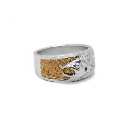 22K Nugget Salmon Ring by Tom Gregorczyk. The design depicts a salmon's profile facing the left and 22K gold nuggets behind the head of the salmon, creating a 3D effect.