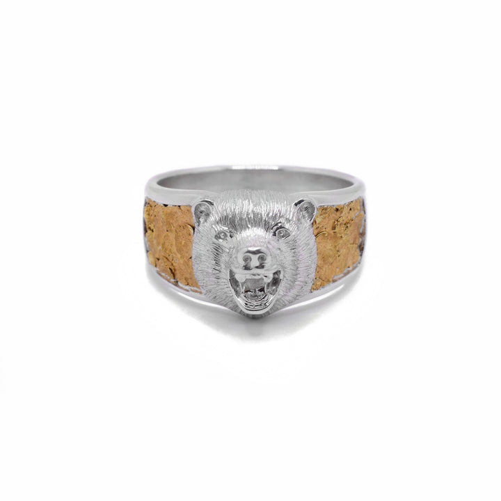 Sterling Silver and 22K Nugget Bear Ring by Tom Gregorczyk. The design depicts the head of a bear with an open mouth extending from the front of the ring with 22K gold nugget on both sides of the bear.