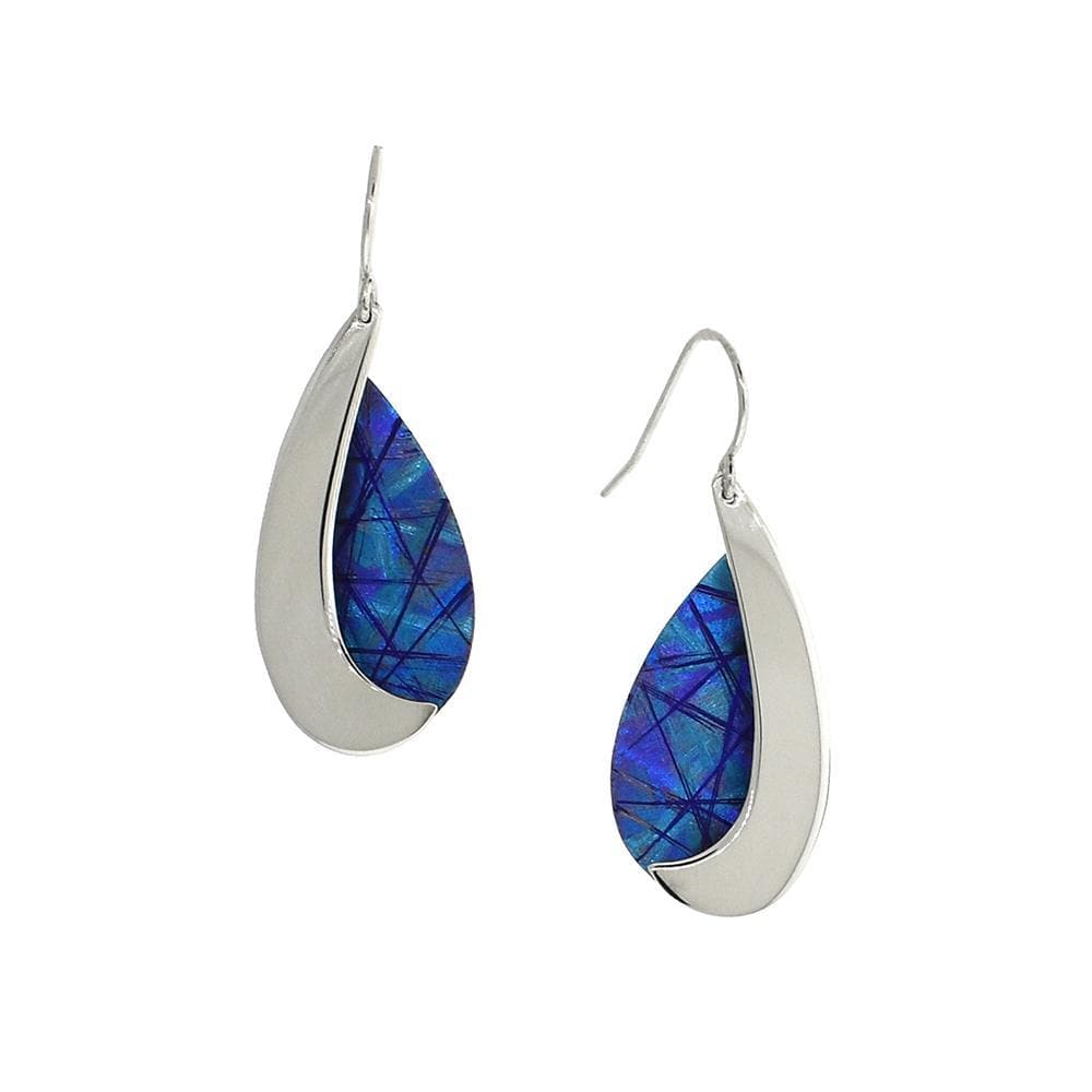 These titanium dangle earrings are made from anodized titanium and sterling silver with teardrop shaped hangs. Half of the hangs are blue with colorful designs achieved by anodizing the metal and the other half is sterling silver.