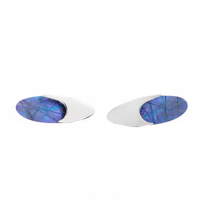 Blue Titanium Oval Stud Earrings are handmade by artist Jean-Yves Nantel.