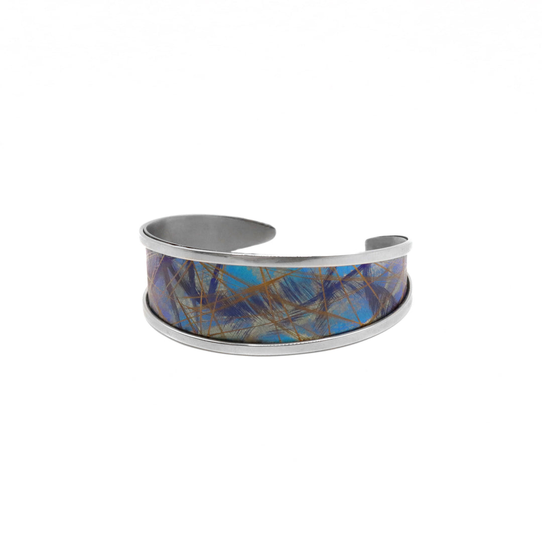 Turquoise Titanium Tapering Bracelet handmade by artist Jean-Yves Nantel.