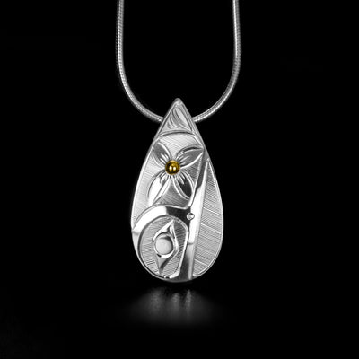 14K Gold and Sterling Silver Teardrop Hummingbird with Flower Pendant hand-carved by Haisla artist Hollie Bartlett.