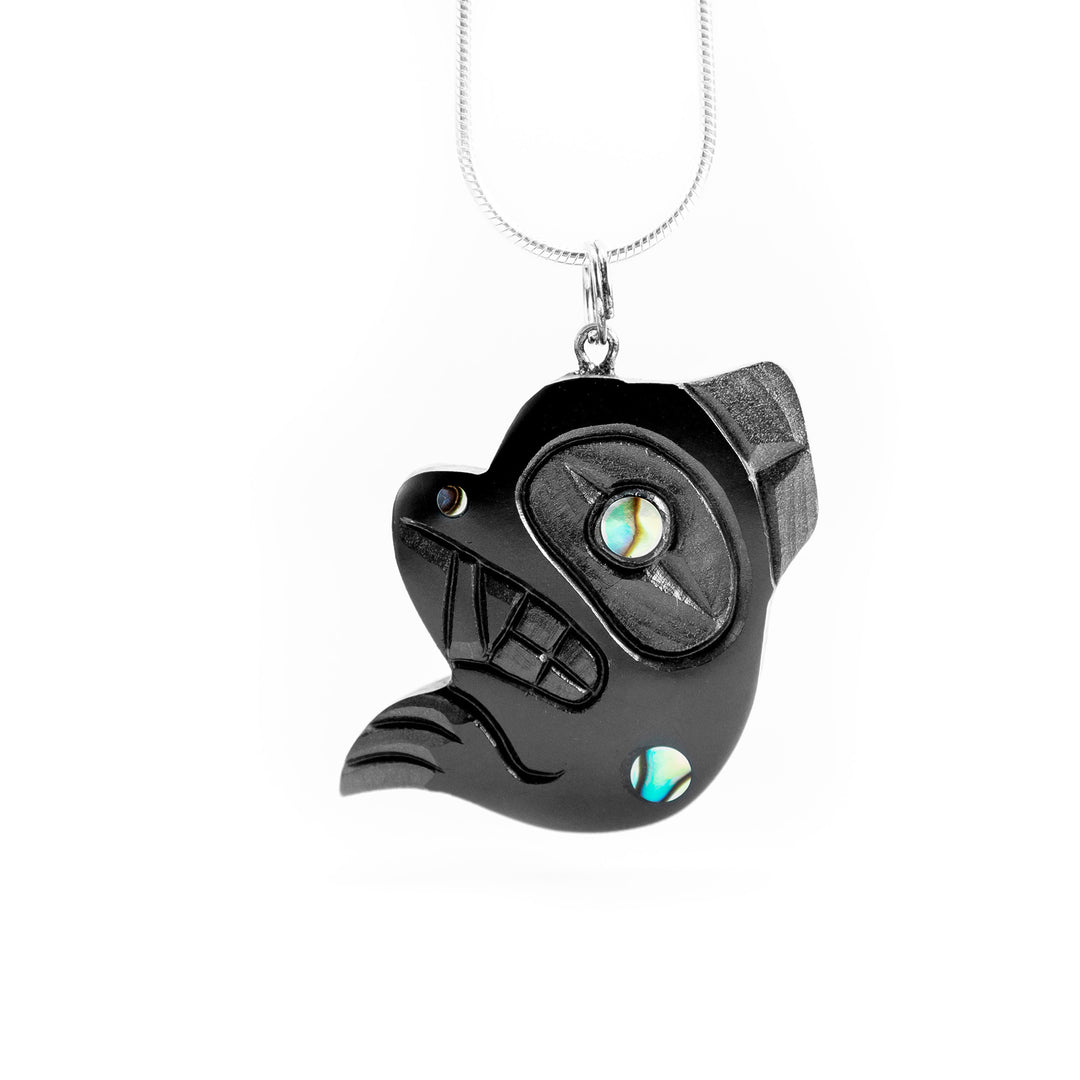 Argillite Bear with Paw Pendant is hand carved by Haida artist, Amy Edgars.