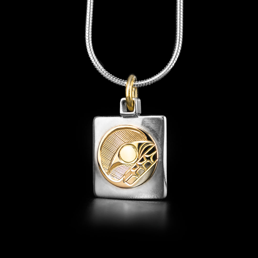Sterling Silver and 14k Gold Rectangular Orca Pendant hand-carved by Haisla artist Hollie Bartlett.