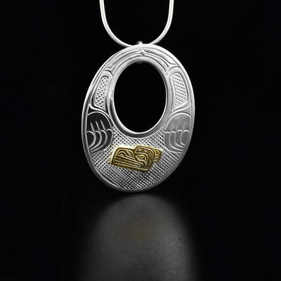 Sterling Silver and 14K Gold Oval Cut Out Bear Pendant
