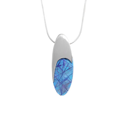 Blue Titanium Oval Necklace is handmade by artist Jean-Yves Nantel.