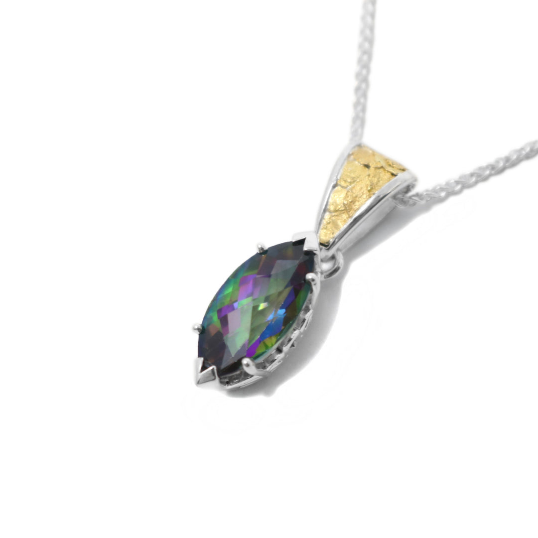 This blue topaz gold pendant is marquise-cut and has the colours blue, purple, green, and red. The topaz is held in place by a sterling silver claw setting. The attached bail has 22k yellow gold nuggets on the front.