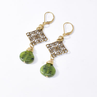 Antique Brass BC Jade Filigree Earrings handcrafted by artist Karley Smith. She has used gold-plated wire and adornments, BC jade and brass to create the earrings. Ear hooks are gold-filled. Each earring measures 2.44" x 0.81" including hook.