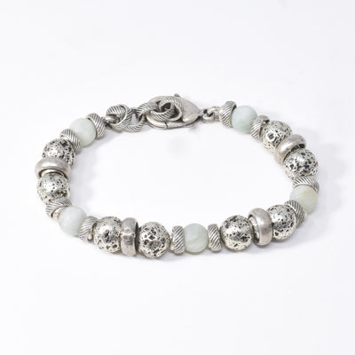 Antique Silver Matte Aquamarine Bracelet handcrafted by artist Karley Smith. She has used antique silver and matte aquamarine to create this piece. Bracelet is 7.5" long with 1" extender.