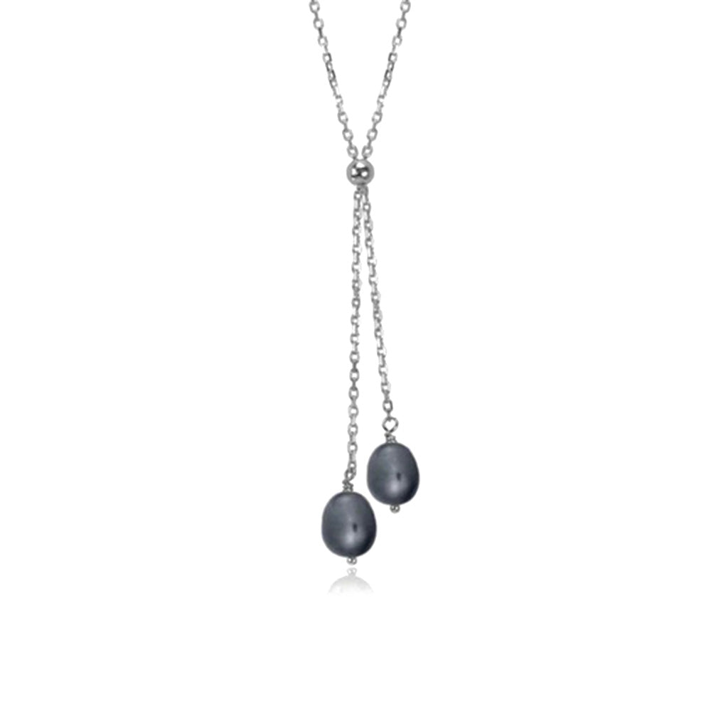 This lariat black pearl necklace is made from sterling silver and black freshwater pearls. The pearls are displayed on two liras that hang below the necklace.