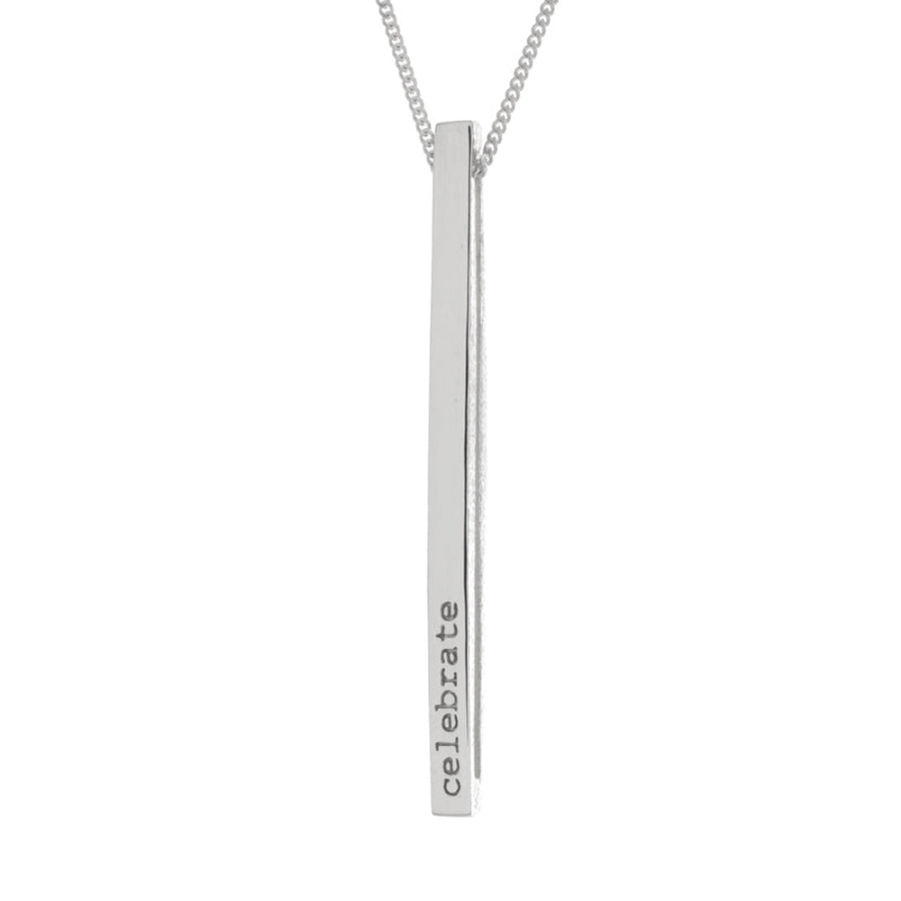This pendant sterling silver necklace has a long, thin and rectangular pendant. On one side of the pendant is marked "Celebrate" and the other "Discover". The mantra pendant can be flipped to read either message.