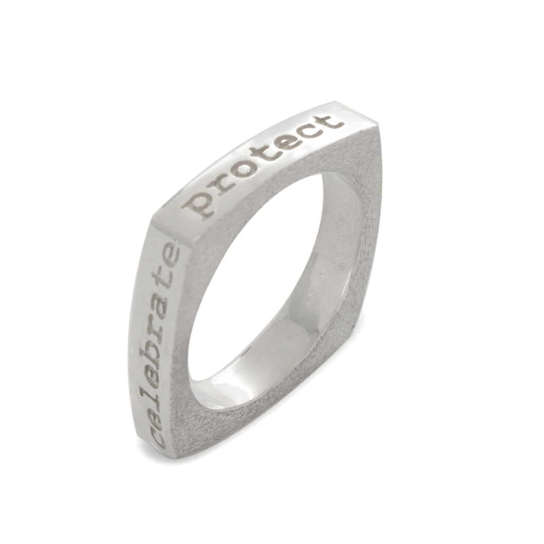 This mantra square ring is made from sterling silver and has a thin, square shaped band. There are affirmations written on each side of the band reading: celebrate, protect, embrace and share.