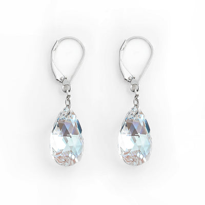 Delicate lever back earrings handcrafted by artist Debra Nelson. Made of Swarovski Crystal and sterling silver. Each earring measures 1.31" x 0.38" including hook.