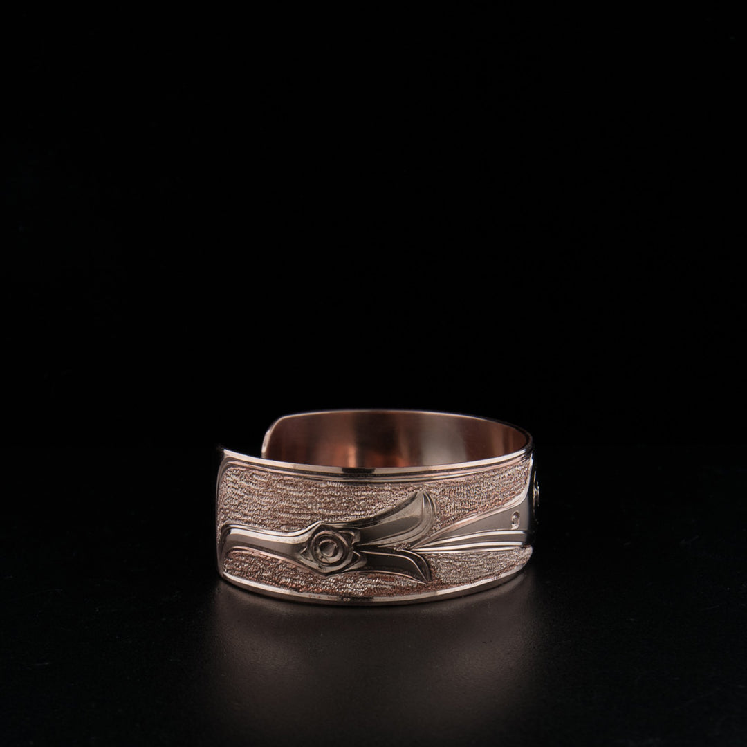 Copper hummingbird bracelet hand-carved by artist Paddy Seaweed.
