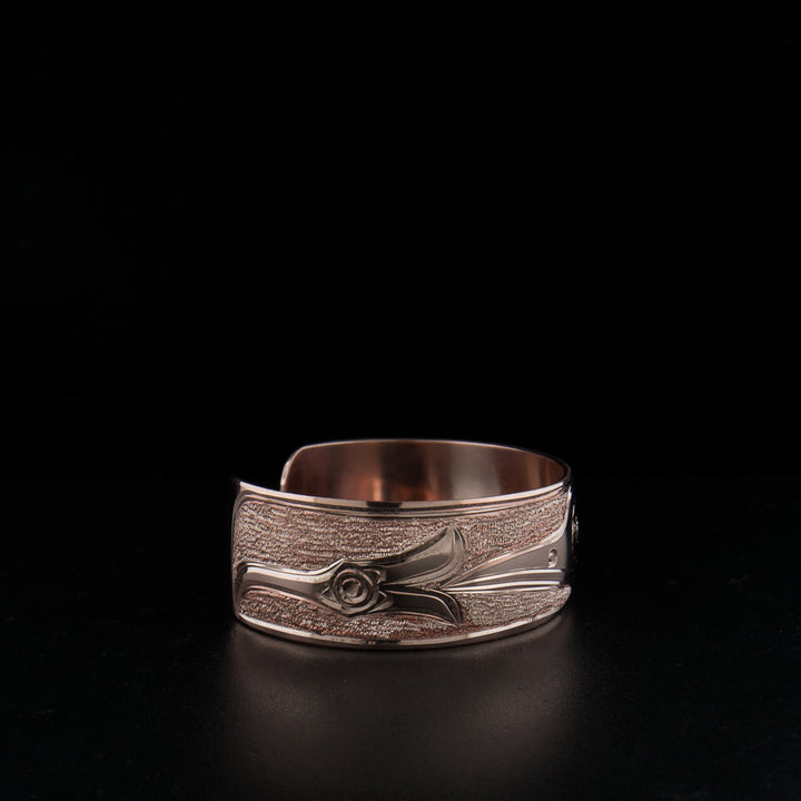 Copper hummingbird bracelet hand-carved by artist Paddy Seaweed.