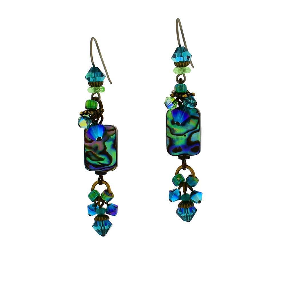The unique, crystal dangle earrings are made from pressed glass, brass, crystals, and abalone gemstones. The hooks are made from brass and have square abalone beads with many glass and crystal embellishments.
