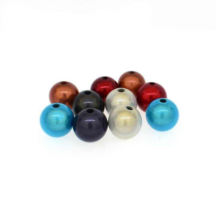 These dangle bead earrings are made from sterling silver wire that has been spiraled to hold interchangeable different colored beads.