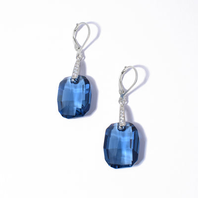 Swarovski Crystal lever-back earrings handcrafted by artist Debra Nelson. Made of Swarovski Crystal, cubic zirconia and sterling silver. Each earring measures 1.70" x 0.55" including hook.