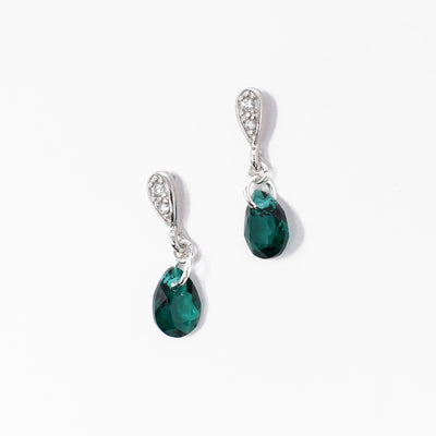 Delicate teardrop dangle stud earrings handcrafted by artist Debra Nelson. She used Swarovski Crystal, sterling silver and cubic zirconia to create them. Each earring measures 0.88" x 0.25".
