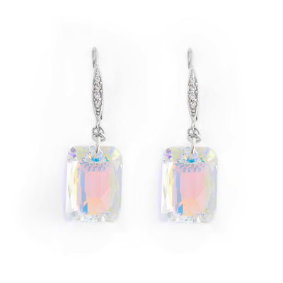 Decadent lever back earrings handcrafted by artist Debra Nelson. Made of sterling silver, cubic zirconia and Aurora Borealis Swarovski Crystal. Each earring measures 1.44" x 0.44" including hook.