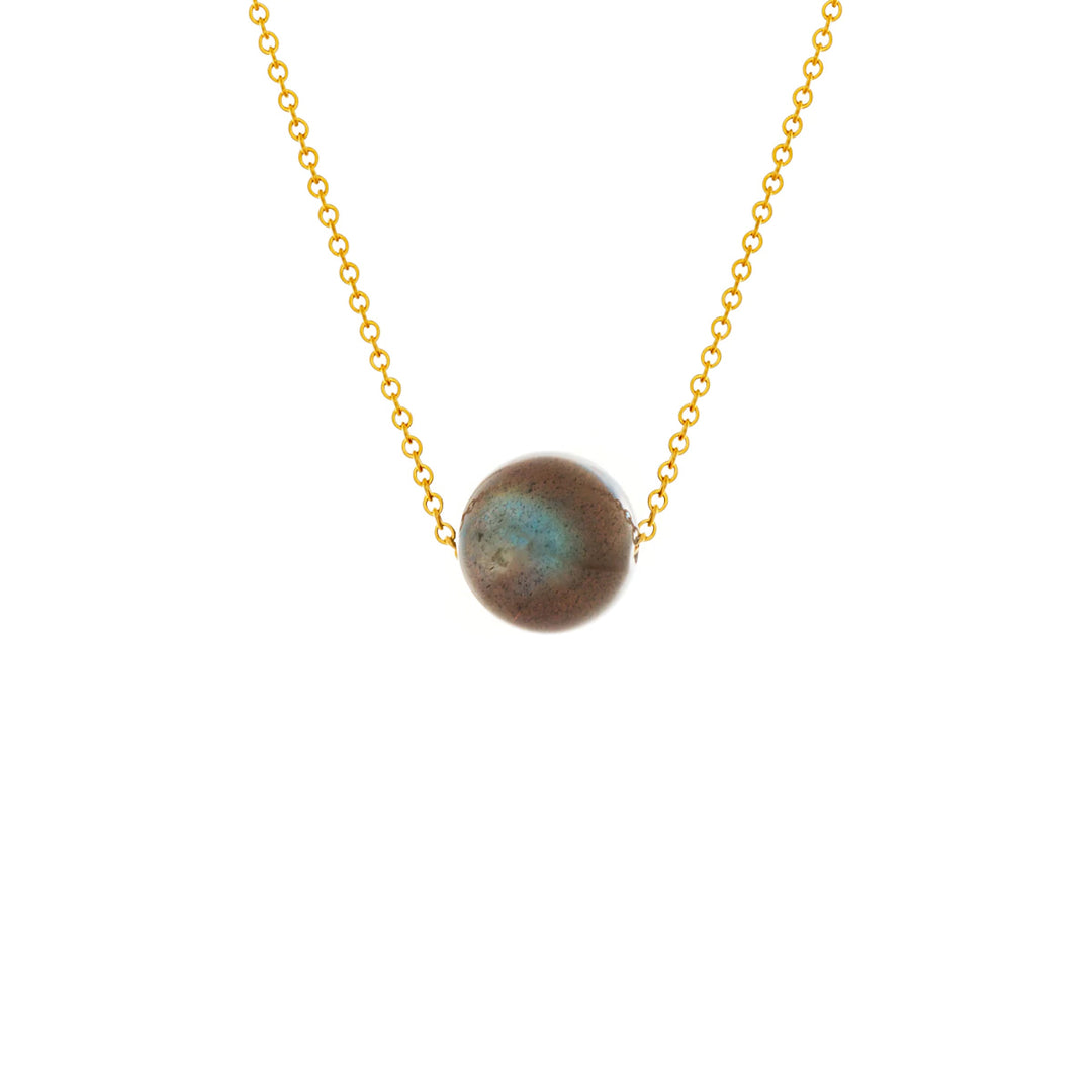 This labradorite necklace is made from 14K gold fill and a polished labradorite sphere. The dainty chain runs through the bead and there are gorgeous colours displayed on the bead