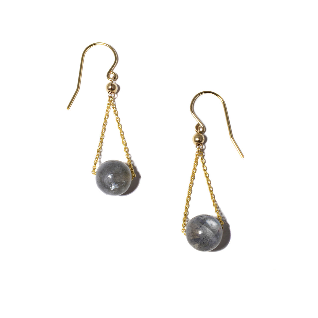 These drop labradorite earrings are made from 14K gold fill and labradorite gemstones. The labradorite spheres have gold chains running through them giving them a chandelier appearance.