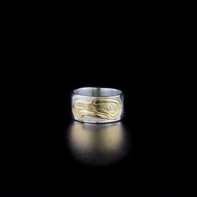 Silver and gold eagle ring hand-carved by Kwakwaka'wakw artist Norman Seaweed. He used 14K gold for the face of the eagle and sterling silver for the rest of the piece. Width of band is 0.38". Size 8.