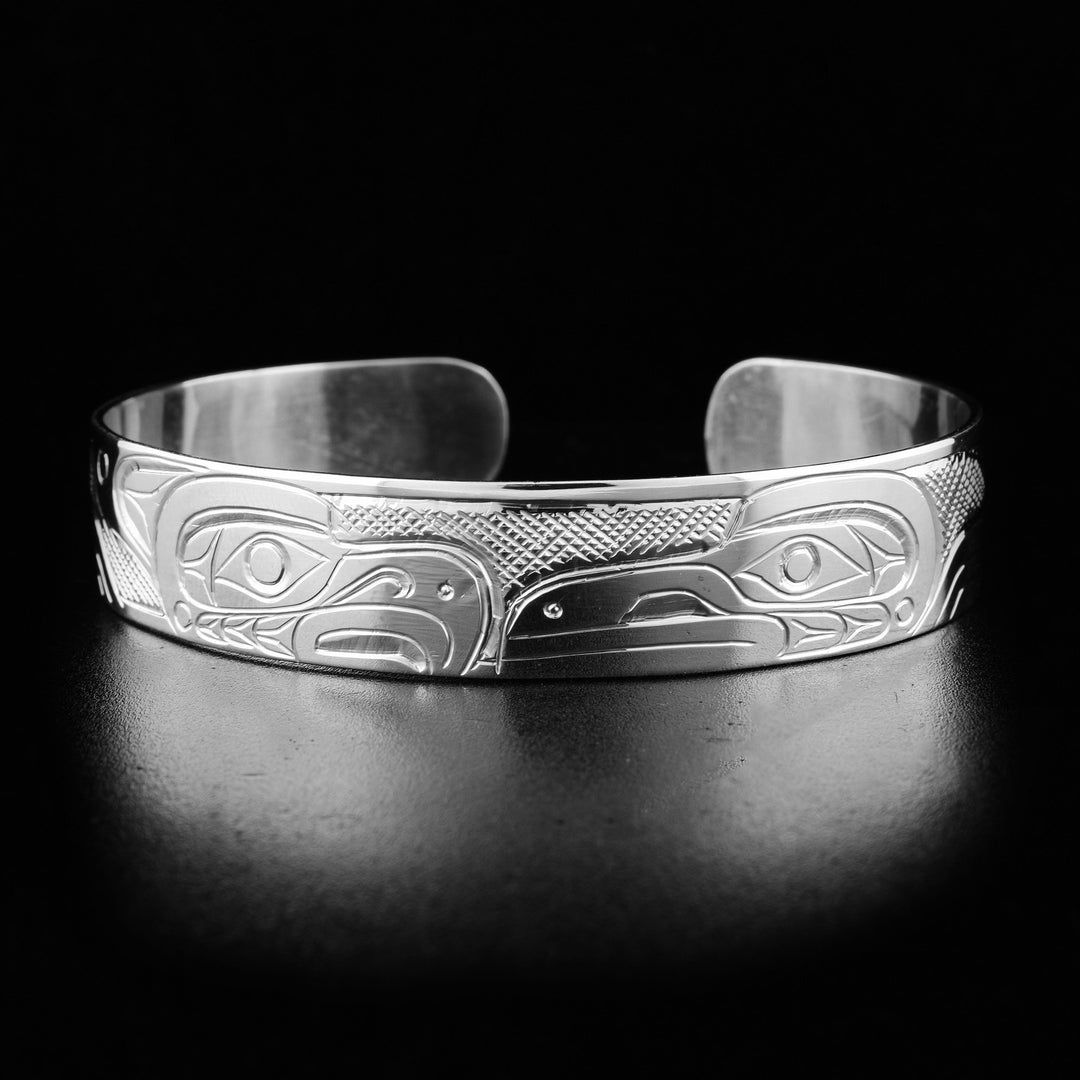 Sterling silver eagle and raven cuff bracelet.