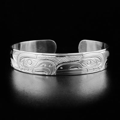 Sterling silver eagle and raven cuff bracelet.