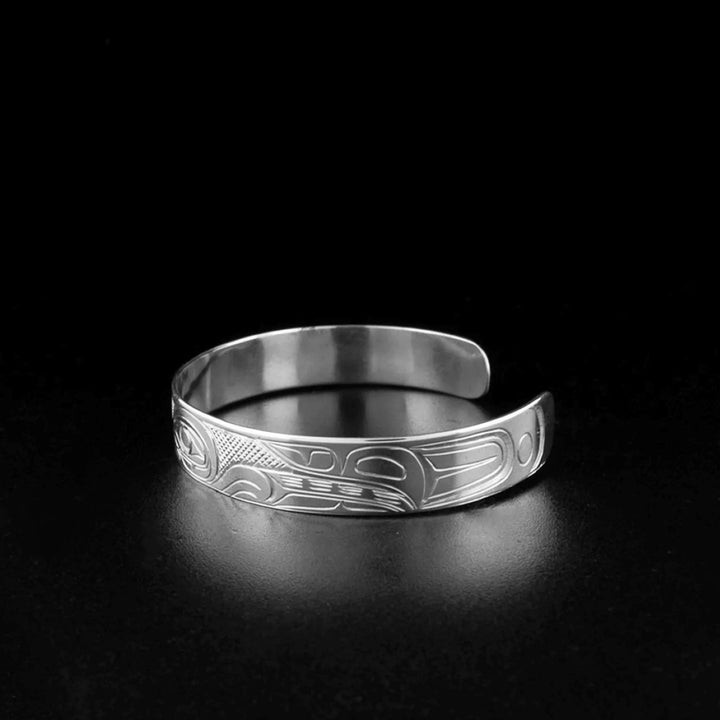 Right angle photo of the hummingbird bracelet shows the body and wings of the hummingbird.