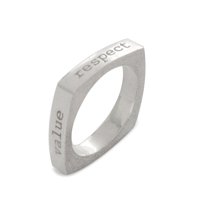 This mantra square ring is made from sterling silver and has a thin, square shaped band. There are affirmations written on each side of the band reading: love, trust, value and respect.