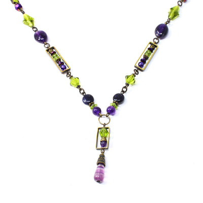 Mystic Delica Necklace by Honica. Made of serpentine jade, Austrian crystal, amethyst, peridot, fluorite, glass and antique brass.