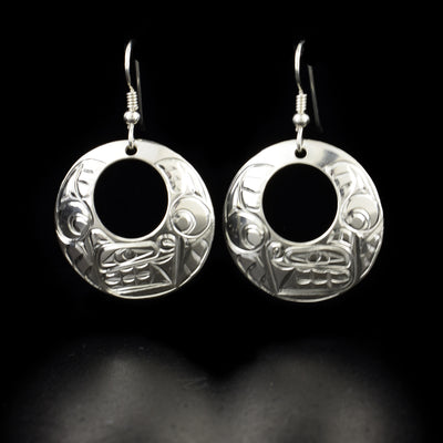 Round Sterling Silver Bear Cut Out Earrings hand-carved by Coast Salish and Cree artist Richard Lang. Each earring measures 1.63" x 1" including hook.