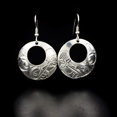 Round Sterling Silver Hummingbird Cut Out Earrings hand-carved by Coast Salish and Cree artist Richard Lang. Each earring measures 1.63" x 1" including hook.
