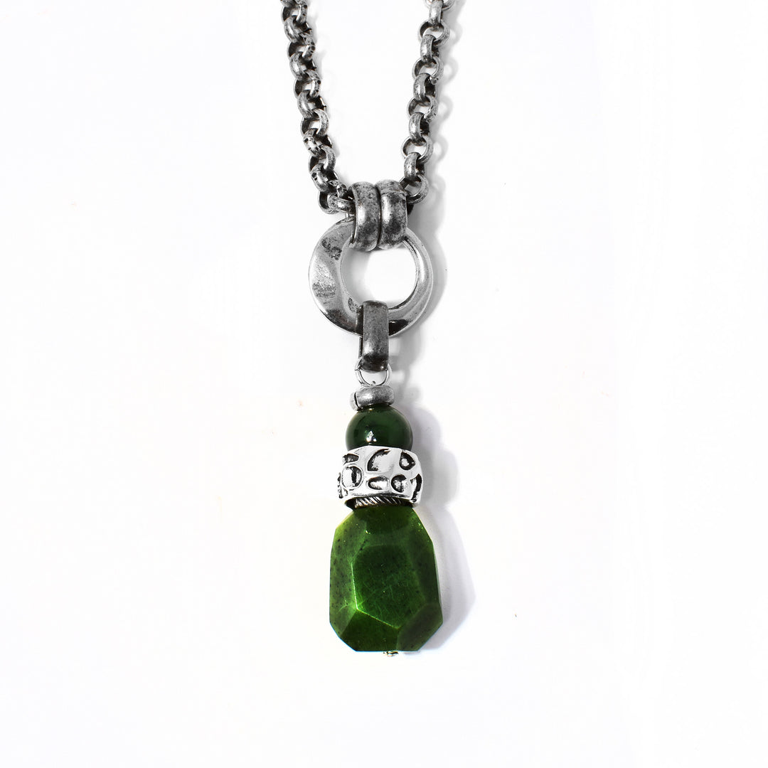 Silver and Jade Cobblestone Pendant Necklace handcrafted by artist Karley Smith. Pendant is made of antique silver, oxidized silver and BC jade. Antique silver Rolo chain included. Pendant measures 2.88" x 0.63" including bail. Chain is 20.25" long.