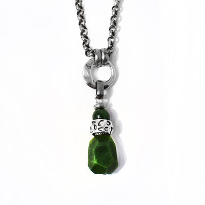 Silver and Jade Cobblestone Pendant Necklace handcrafted by artist Karley Smith. Pendant is made of antique silver, oxidized silver and BC jade. Antique silver Rolo chain included. Pendant measures 2.88" x 0.63" including bail. Chain is 20.25" long.