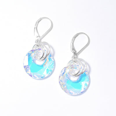 Dazzling lever back earrings handcrafted by artist Debra Nelson. Made of Aurora Borealis Swarovski Crystal and sterling silver. Each earring measures 1.50" x 0.69" including hook.