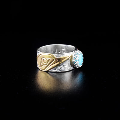 Soft Square Hummingbird Ring with Turquoise hand-carved by Coast Salish and Cree artist Richard Lang. Made of sterling silver, turquoise and 14K gold. Ring has a slightly squared shape to it, rather than being completely round. Width of band is 0.38". Size 9.