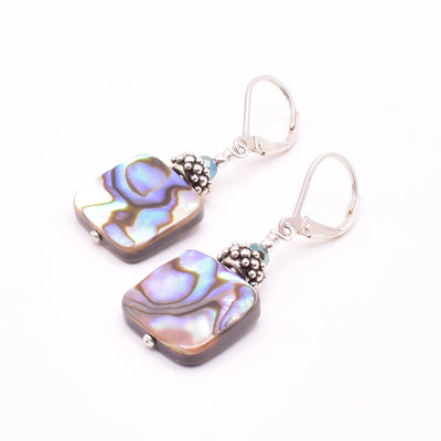 Unique lever back earrings handcrafted by artist Karley Smith. Made of sterling silver, oxidized silver, Swarovski Crystal and abalone. Ear hooks are sterling silver. Each earring measures 1.55" x 0.60" including hook.