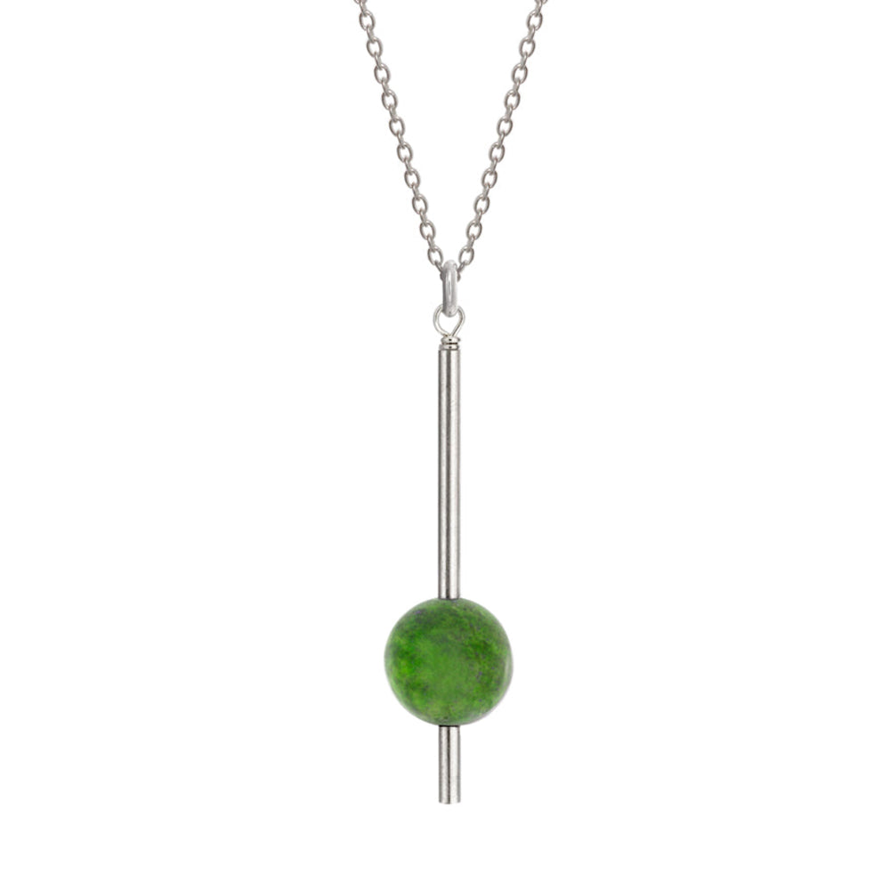 This jade pendant necklace is made from sterling silver and genuine BC jade (nephrite) and has a single, long pendant. There is a silver wire with a circle shaped jade gem running thought it at the bottom.