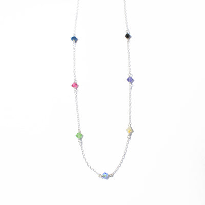 Dazzling Swarovski Crystal station necklace handcrafted by artist Debra Nelson. Made of sterling silver and bicone-shaped Swarovski Crystals in various colours. Necklace is available in 15" and 16".