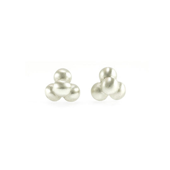 These bubble earrings studs are made from sterling silver and are 3D designs depicting a group of four bubbles.
