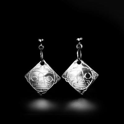 Sterling Silver Diamond-Shaped Moon Stud Dangle Earrings by Gilbert Pat. Each earring is in a diamond-shape. The artist has hand-carved the face of a moon looking forward in each earring.