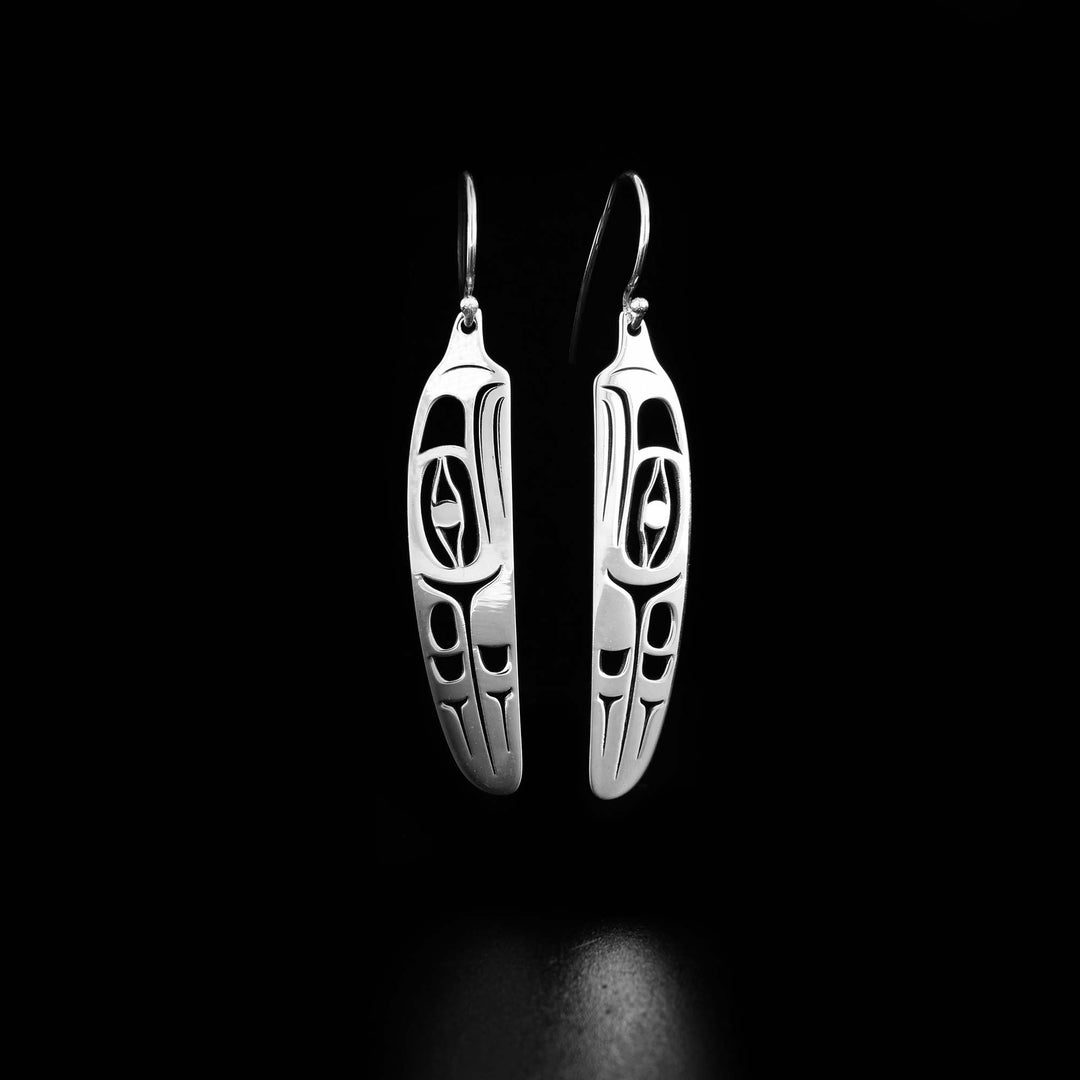 These sterling silver feather earrings have feather shaped hangs with cutout designs depicting the Eagle.