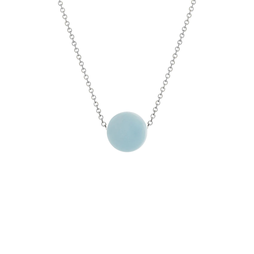 Sterling Silver Element Aquamarine Slide Necklace by artist Pamela Lauz. She has used a round aquamarine bead and a sterling silver chain to create this delicate minimalist piece. The bead is 0.39" in diameter and the adjustable chain can be 16" or 18" long.