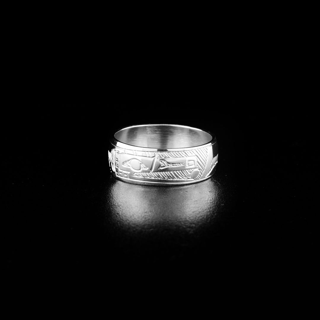 This Raven ring is made from sterling silver and has a single, wide band. There is a depicting of the Raven carved into the surface of the band.