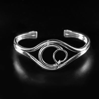 Gratitude Cuff Bracelet handcrafted by artist Lynda Constantine. Made of sterling silver. Bracelet is 6.19" long with 1.13" gap and is 0.94" wide at widest.