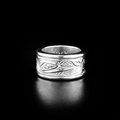 Stunning hummingbird spinner ring hand-carved by Coast Salish and Cree artist Richard Lang. Made of sterling silver. Ring is 0.4" wide and is size 6.5.